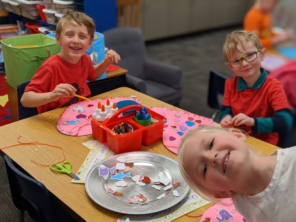 students making valentines decorations