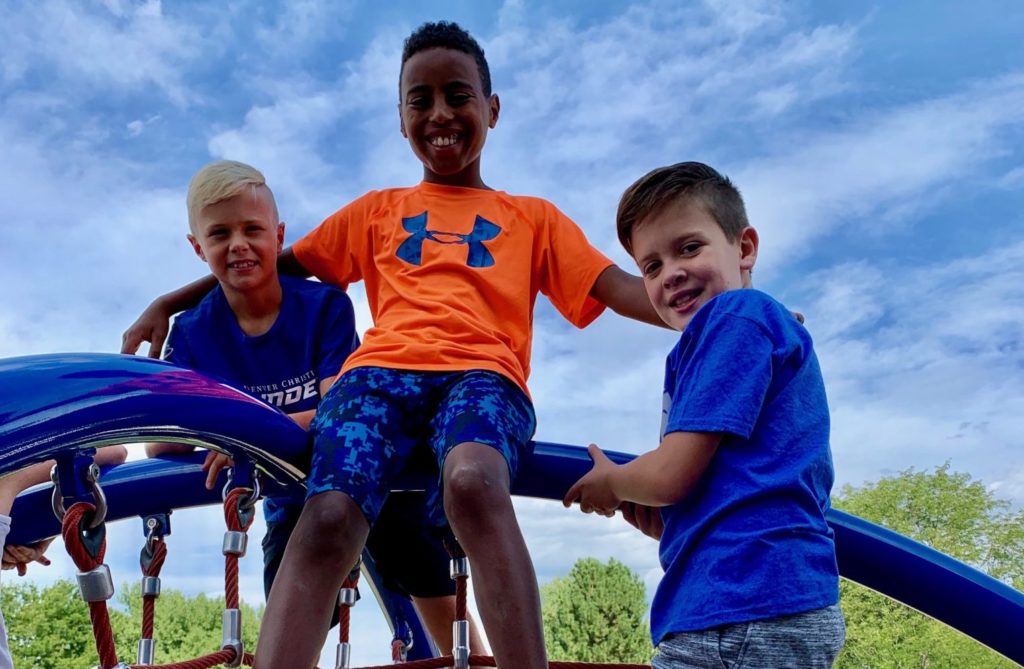 group of boys playing on playground